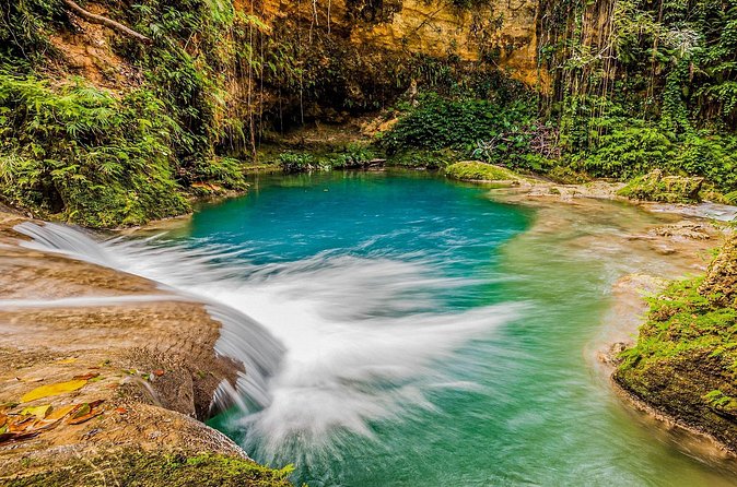Action Pack Combo: Blue hole, river tubing and Dunn's River Falls - What river tubing adds to the day