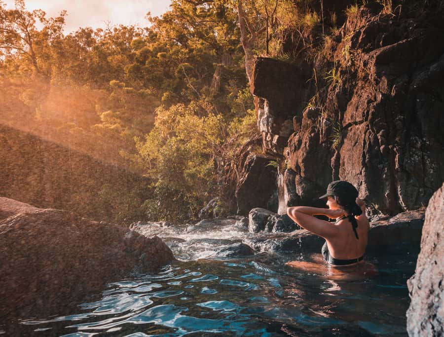 Airlie Beach: Cedar Creek Falls & Northerlies Beach Day Trip - What the guides add to the day