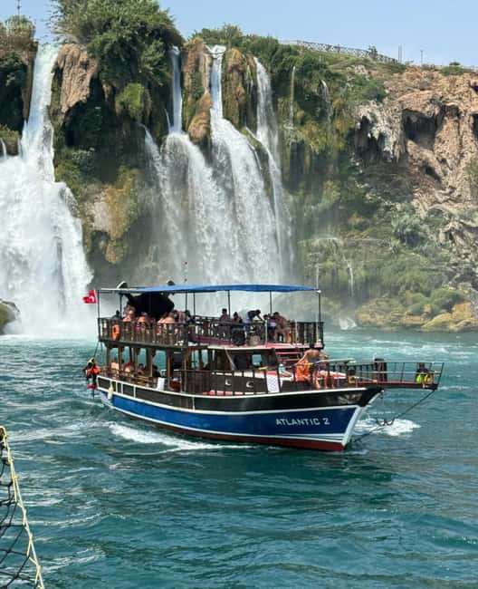 Antalya: Duden Waterfall Relax Boat Trip with Lunch - Lara Bay Beach from the sea