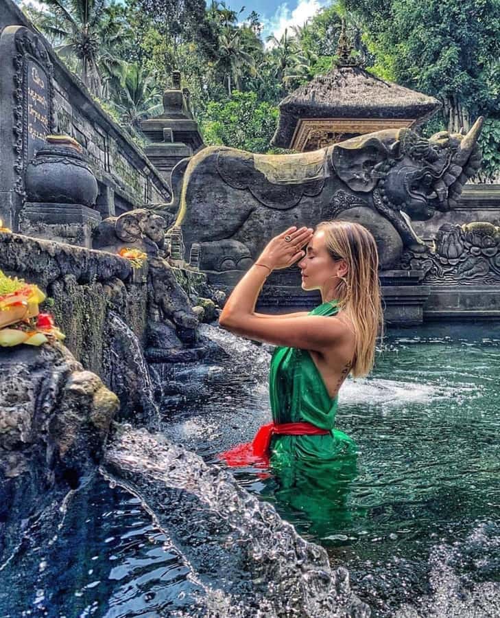 Bali: Kintamani Cafe, Waterfall, Temple and Cretya Ubud Tour - Tirta Empul and the meaning of holy water