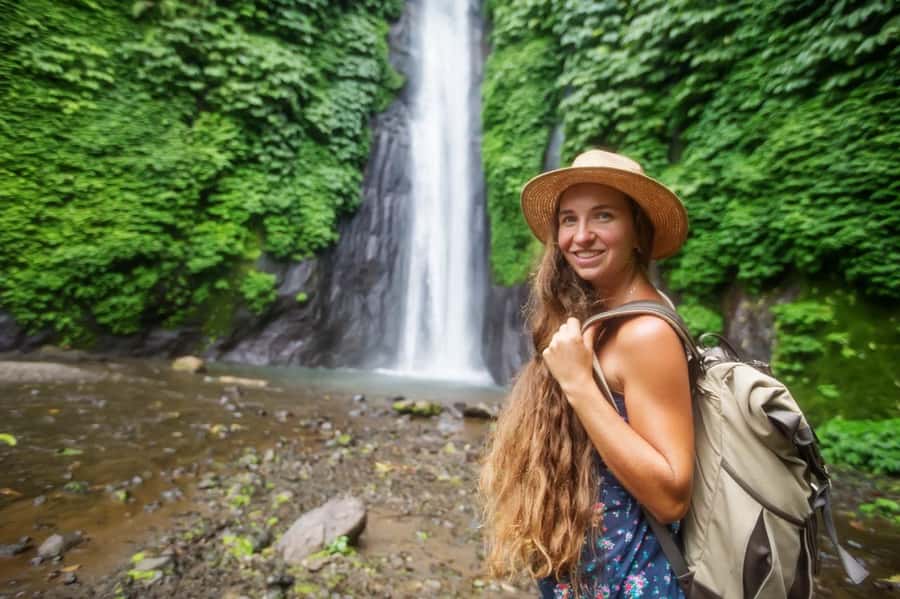 Bali: Munduk Waterfalls Trek, Twin Lakes and Temple Tour - Crossing Tamblingan in a traditional canoe