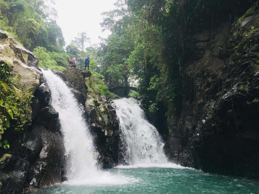 Bali: Sambangan Waterfalls Trekking, Sliding, & Jumping Trip - Pucuk Waterfall and the 15-meter choice