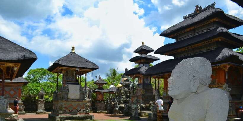 Bali: Ubud Waterfall, Village and Pool Club Day Trip - Batuan Temple and the carved details of an old village