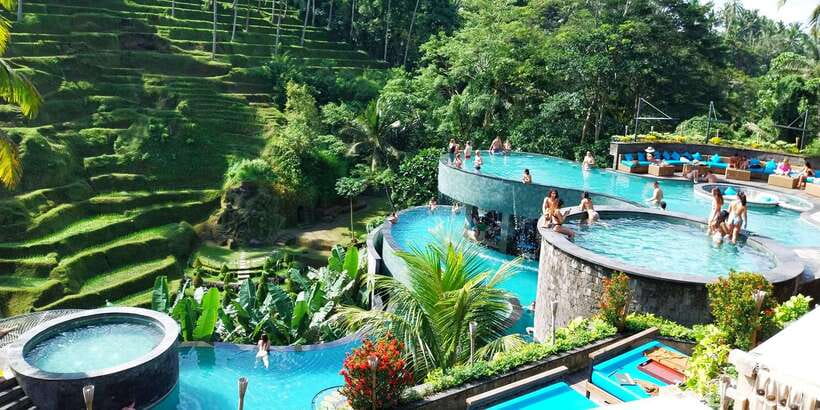 Bali: Ubud Waterfall, Village and Pool Club Day Trip - Tegenungan Waterfall and the long stairway down