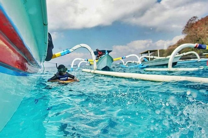 Blue Lagoon Snorkeling and Lunch - Kanto Lampo - Tibumana Waterfall-All Included - Kanto Lampo Waterfall and the photo queue