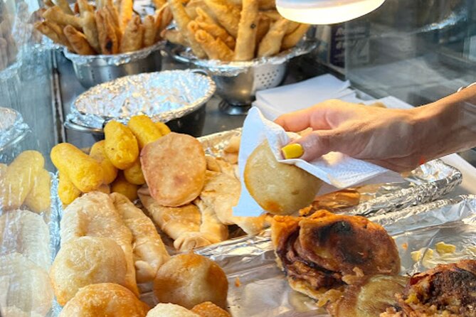 El Yunque Waterslide and Waterfall Tour with Food and Photos - Puerto Rican food and the Luquillo Beach stop