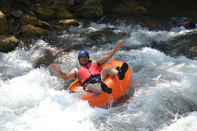 Falmouth Waterfalls River Tubing and Beach Adventure - From tubes to a raft at the river mouth