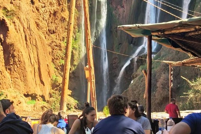From Marrakech: Full-Day Tour to Ouzoud Waterfalls with Boat Trip - The short boat ride beneath the cascades