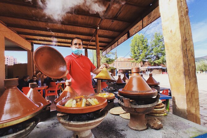 From Marrakech: Full-Day Tour to Ouzoud Waterfalls with Boat Trip - Following the trails above the falls