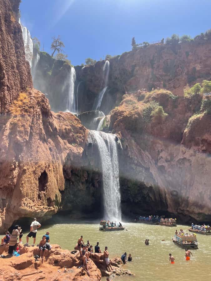 From Marrakech: Ouzoud Waterfalls Guided Hike and Boat Trip - The short boat ride beneath the 110-meter cascade