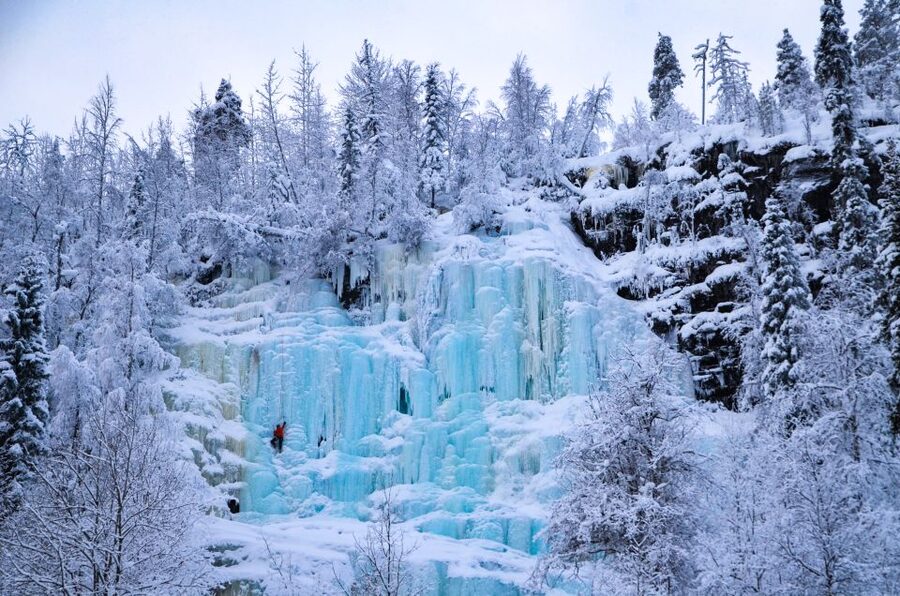 From Rovaniemi: Korouoma Canyon and Frozen Waterfalls Tour - A Finnish campfire, sausage, and a welcome hot drink