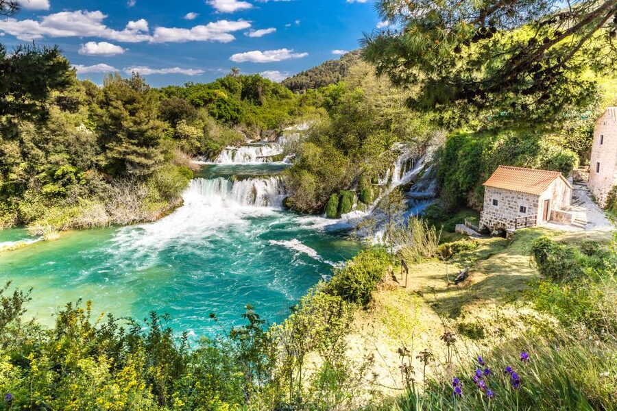 From Split & Trogir: Krka Waterfalls Day Tour with Boat Ride - The boat ride down the Krka River