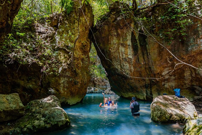 Hiking Tour of La Leona Waterfall with Lunch - The final swim into La Leona Waterfall