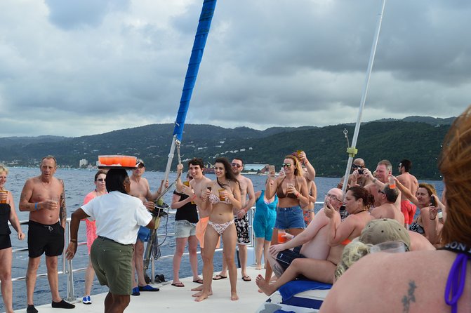 Jamaica Dunn's River Falls Party Cruise with Snorkeling - Climbing the Terraced Falls