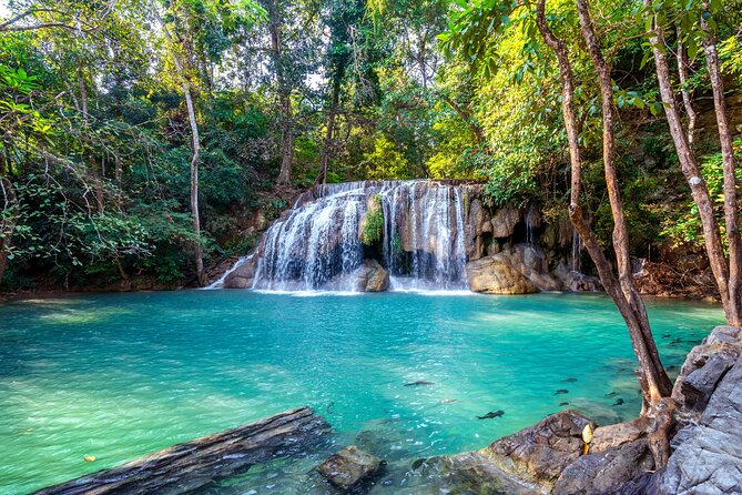 Kanchanaburi Full Day Tour: River Kwai and Erawan Falls - Reaching the River Khwae Bridge by boat