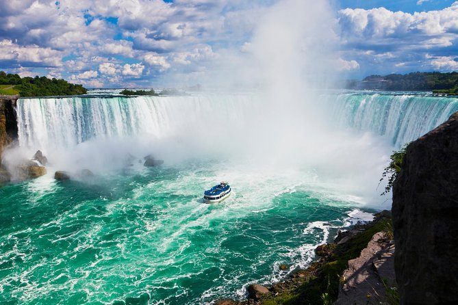 Niagara Falls Canadian Side Tour and Maid of the Mist Boat Ride Option - The Floral Clock and other roadside sights