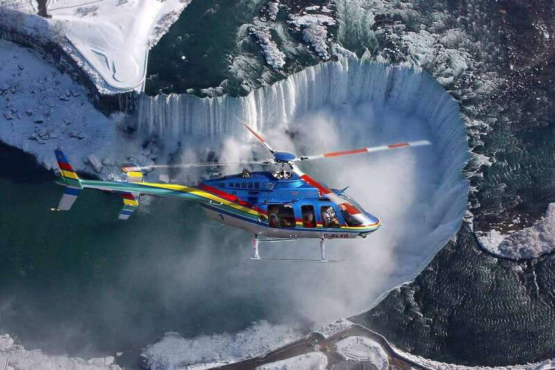 Niagara Falls, ON: Helicopter Ride with Boat & Skylon Lunch - Journey Behind the Falls: Wet, Close, and Worthwhile