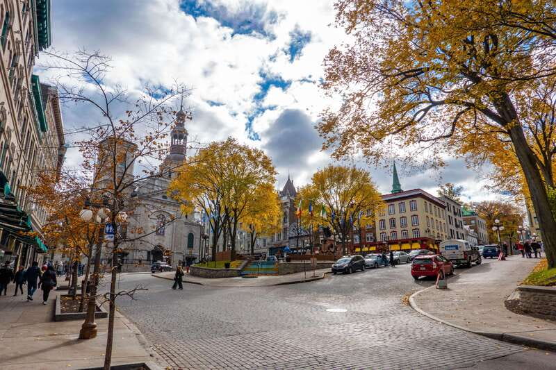 Quebec City: Old Town and Montmorency Falls Bus Tour - Lower town, riverside views, and the city’s early arrivals