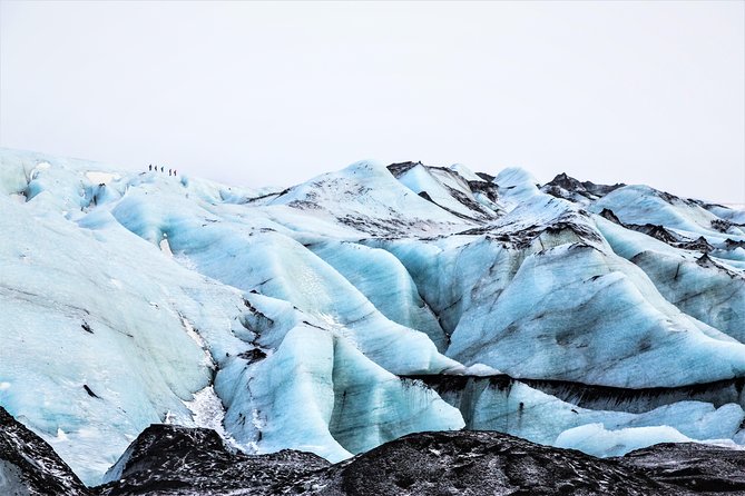 Reykjavik: South Coast, Waterfalls & Glacier Hike Small-Group - Skógafoss brings power and spray