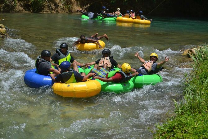 River Rapids Waterfalls Tubing and Beach Adventure with Transport - The short walk to Irie Bridge