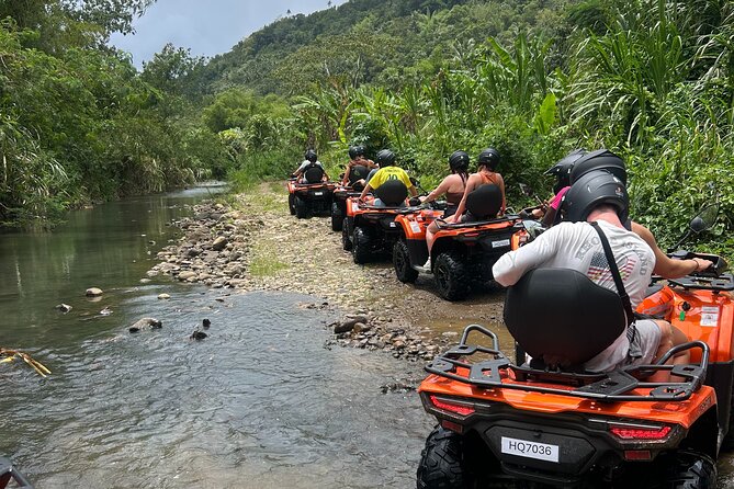 St Lucia ATV Tour : Waterfall, Plantation, Beach and Distillery - Riding through villages and Anse La Raye