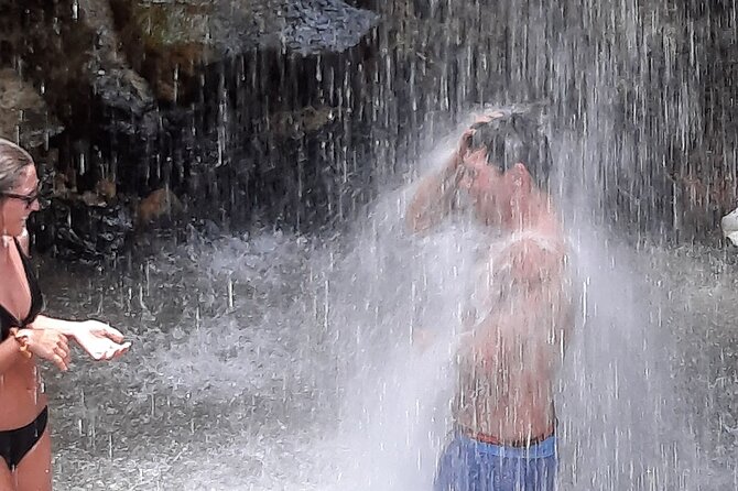 Sulphur Springs Mud Bath and Toraille Waterfall Tour with Creole Lunch - Cooling off at Toraille Waterfall