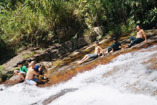 Trekking Tour to Hidden Waterfall & Sturgeon Farm for dog-lovers - A dog-led walk through Da Lat forest