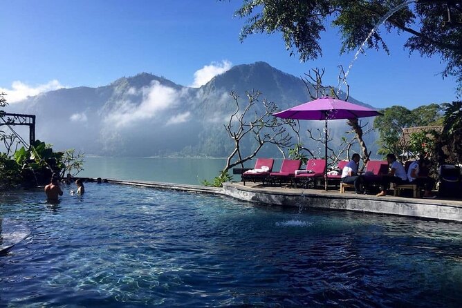 Trunyan Cemetery, Hot Spring, Penglipuran Village, and Waterfall Tour - Tibumana Waterfall closes the day