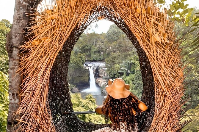 Ubud Day Tour: Sacred Monkey Forest, Tegenungan Waterfall, Rice Terrace - Elephant Cave, a short temple visit with a striking entrance
