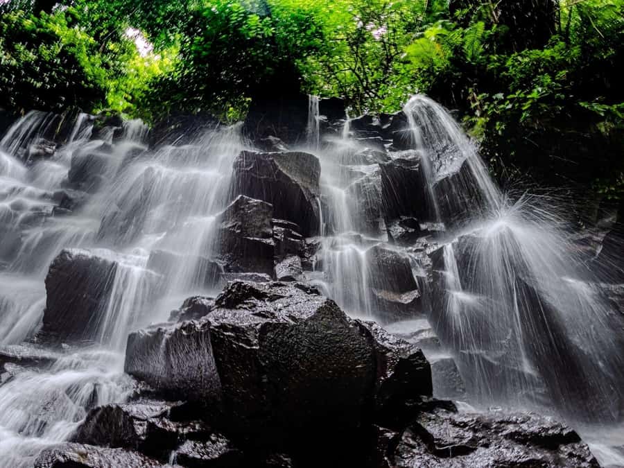 Ubud: Hidden Gems and Waterfalls Private Tour - Goa Raja Waterfall and its cave setting