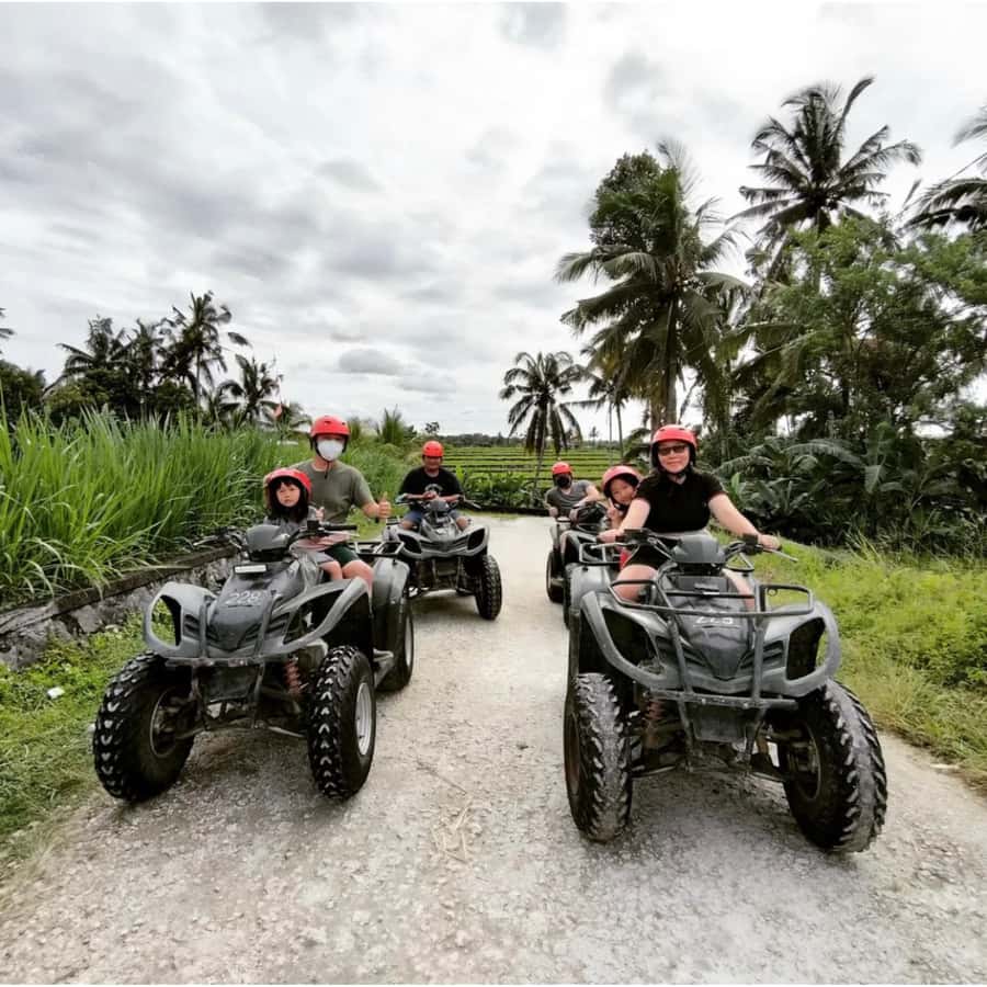 Ubud: Jungle, Waterfall, and Tunnel ATV Tour & Lunch Options - Riding beneath the waterfall