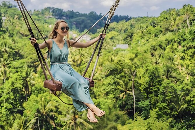Ubud Tour with Monkey Forest Waterfalls Temples and More - Tegenungan Waterfall closes the day