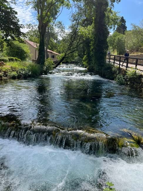 Zadar: Krka Waterfalls Tour, Boat Cruise & Swimming - Walking around Skradinski buk